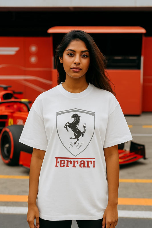 Indian female model wearing SoulSet Scuderia SF Edition oversized black Ferrari t-shirt with monochrome prancing horse logo and deep red branding, posing confidently in a relaxed streetwear look. Bold motorsport-inspired fashion made with premium heavyweight cotton for F1 fans.