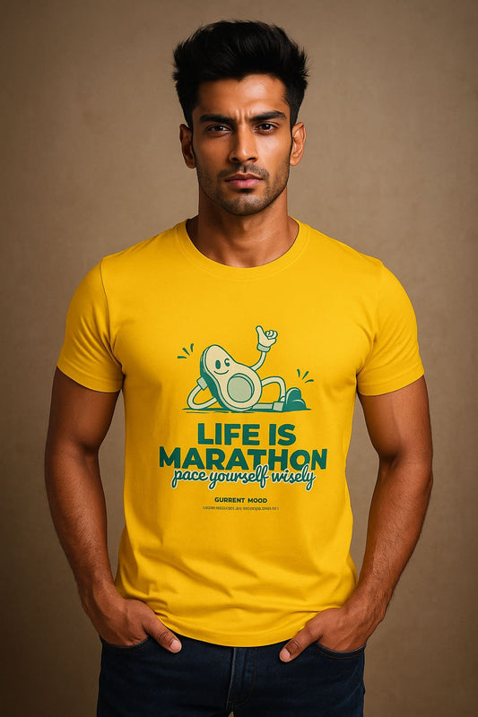 Man wearing a white t-shirt with a green graphic and text on a gray background