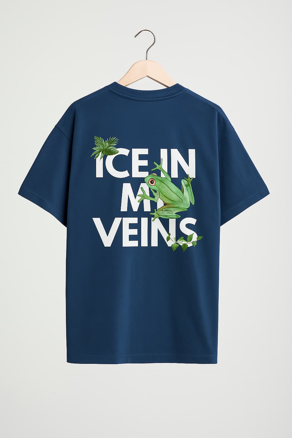 Navy blue t-shirt with a frog graphic and text 'ICE IN MY VEINS' on a white background