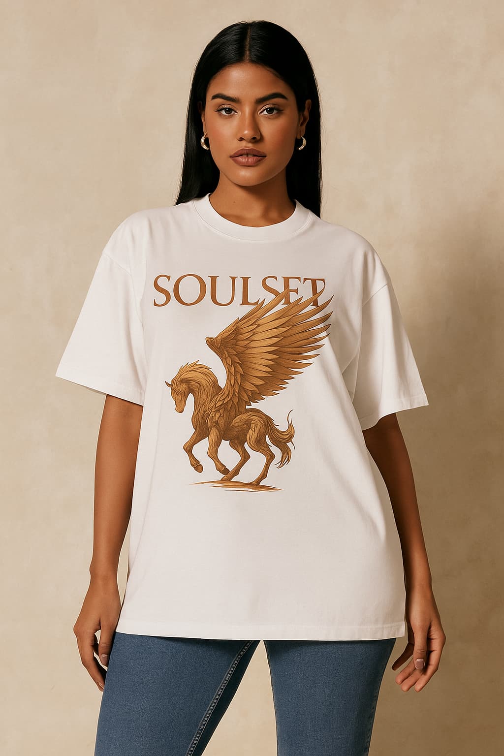 Person wearing a white t-shirt with a gold graphic and 'SOULSET' text on a beige background