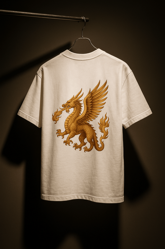 White t-shirt with a gold dragon design on a dark background