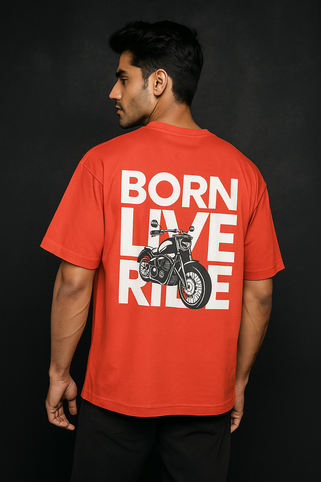 Person wearing a red t-shirt with 'Born Live Ride' text and motorcycle graphic on a black background