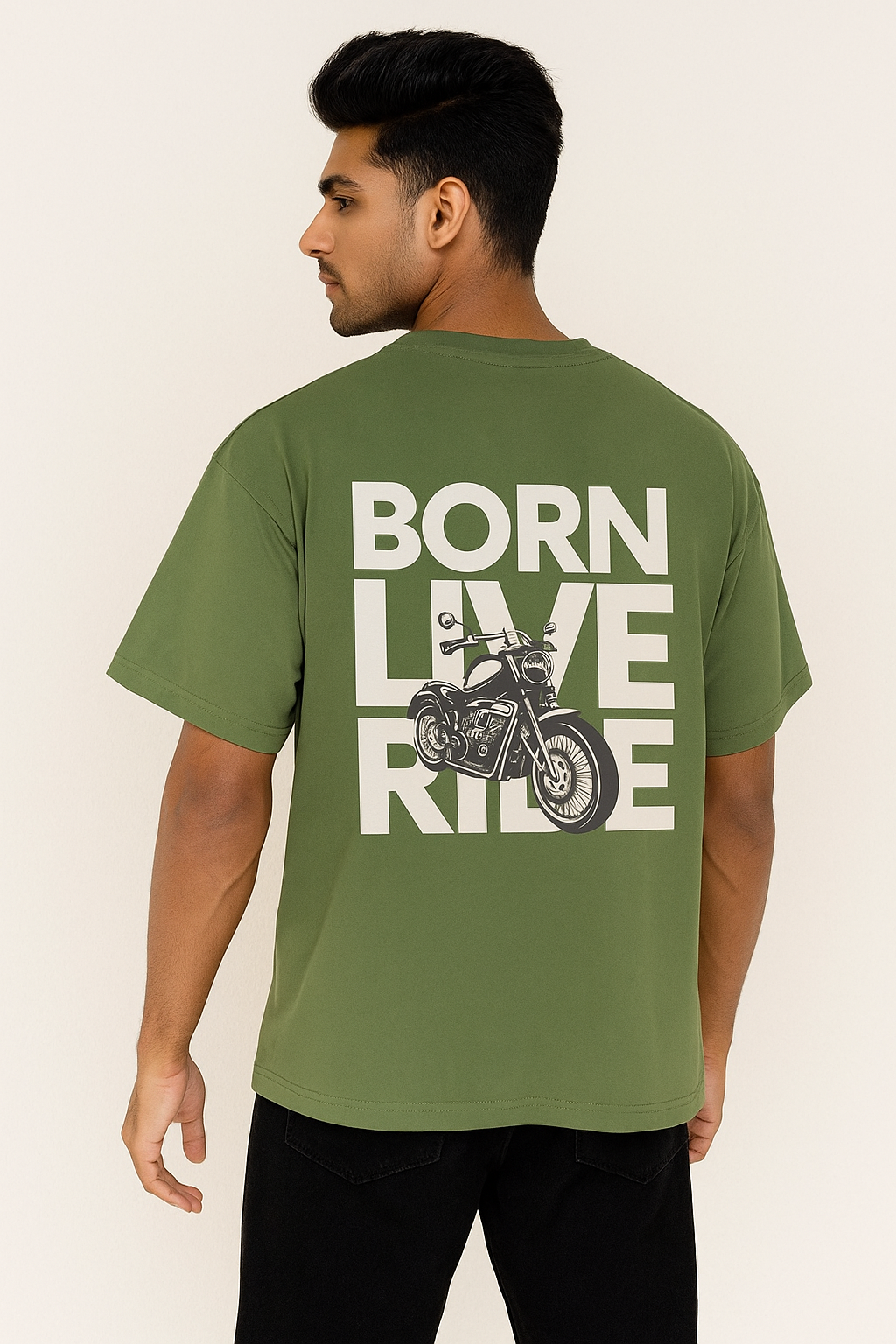Person wearing a green t-shirt with 'Born Live Ride' text and motorcycle graphic on the back.