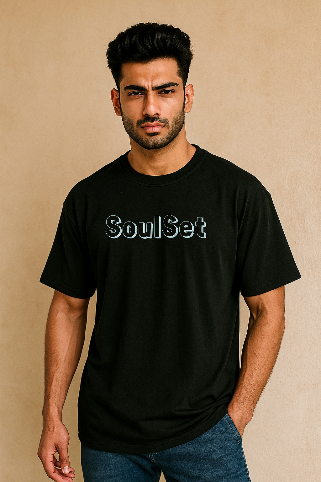 Man wearing a black t-shirt with 'SoulSet' text on a beige background