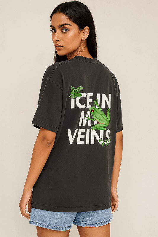 Stylish Indian female model in SoulSet oversized black T-shirt featuring ‘Ice in My Veins’ frog graphic – premium cotton streetwear for bold fashion
