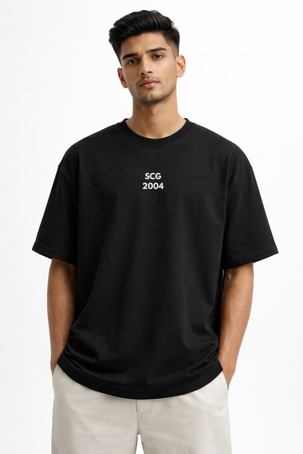 Man wearing a black t-shirt with 'SCG 2004' text on a white background