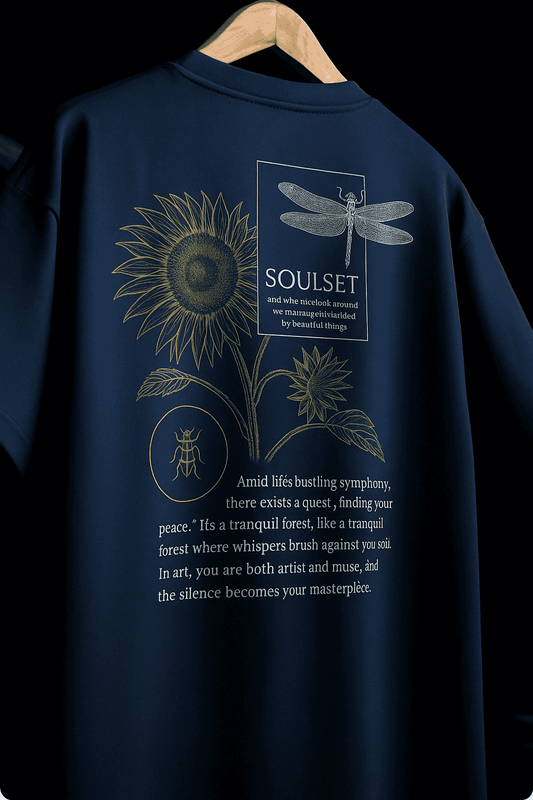 Close-up of navy blue SOULSET T-shirt featuring intricate dragonfly illustration and artistic typography on the back, nature-inspired graphic tee for modern fashion.