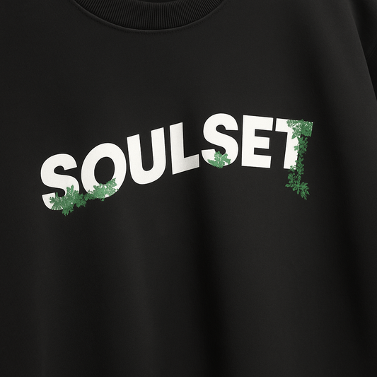 Black sweatshirt with 'SOULset' printed in white and green on a dark background