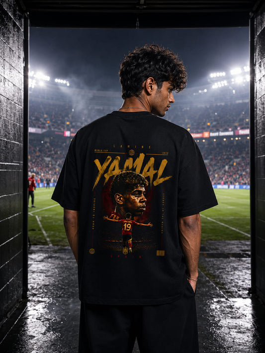Person wearing a black t-shirt with 'YAMAL' and a graphic of a football player on a stadium background