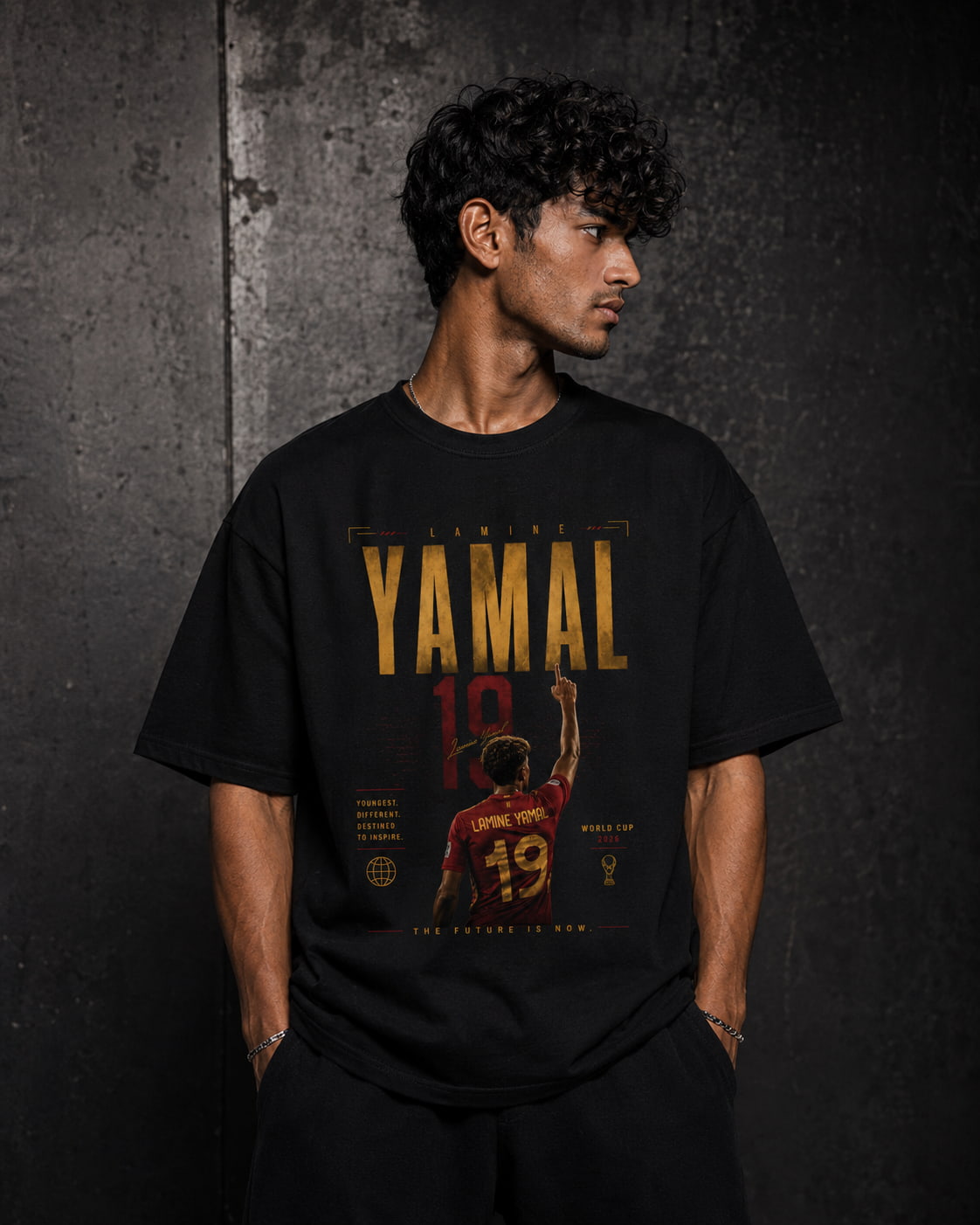 Person wearing a black t-shirt with 'YAMAL' and number '19' design on a dark background