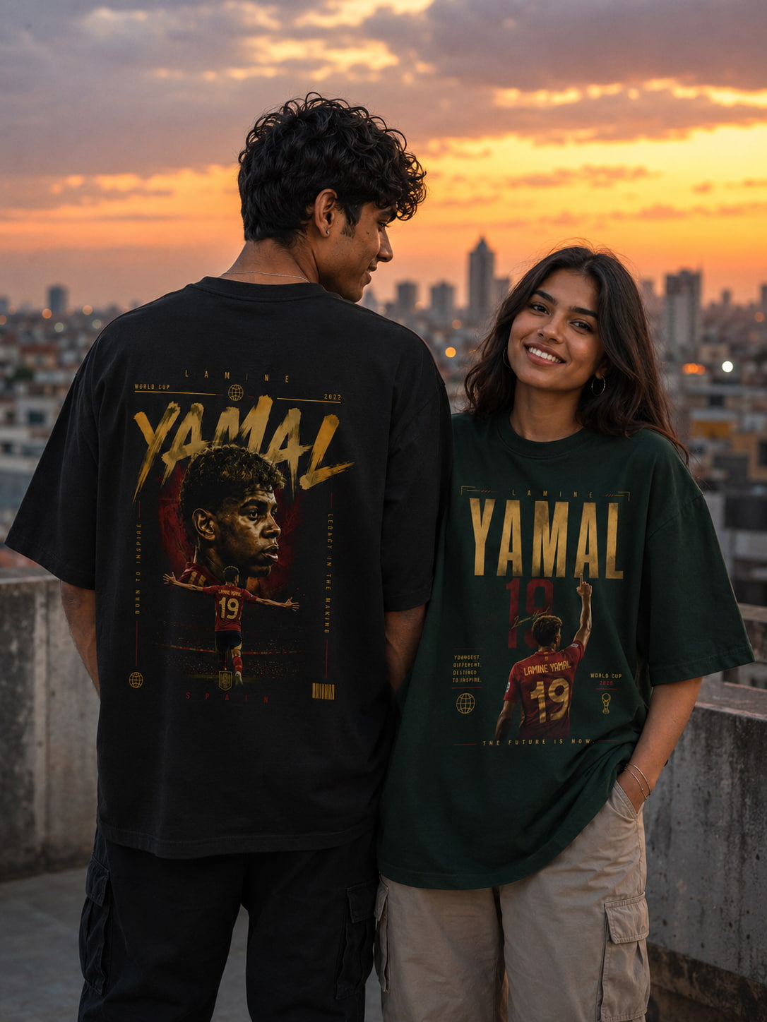 Two people wearing 'YAMAL' t-shirts with a cityscape and sunset in the background