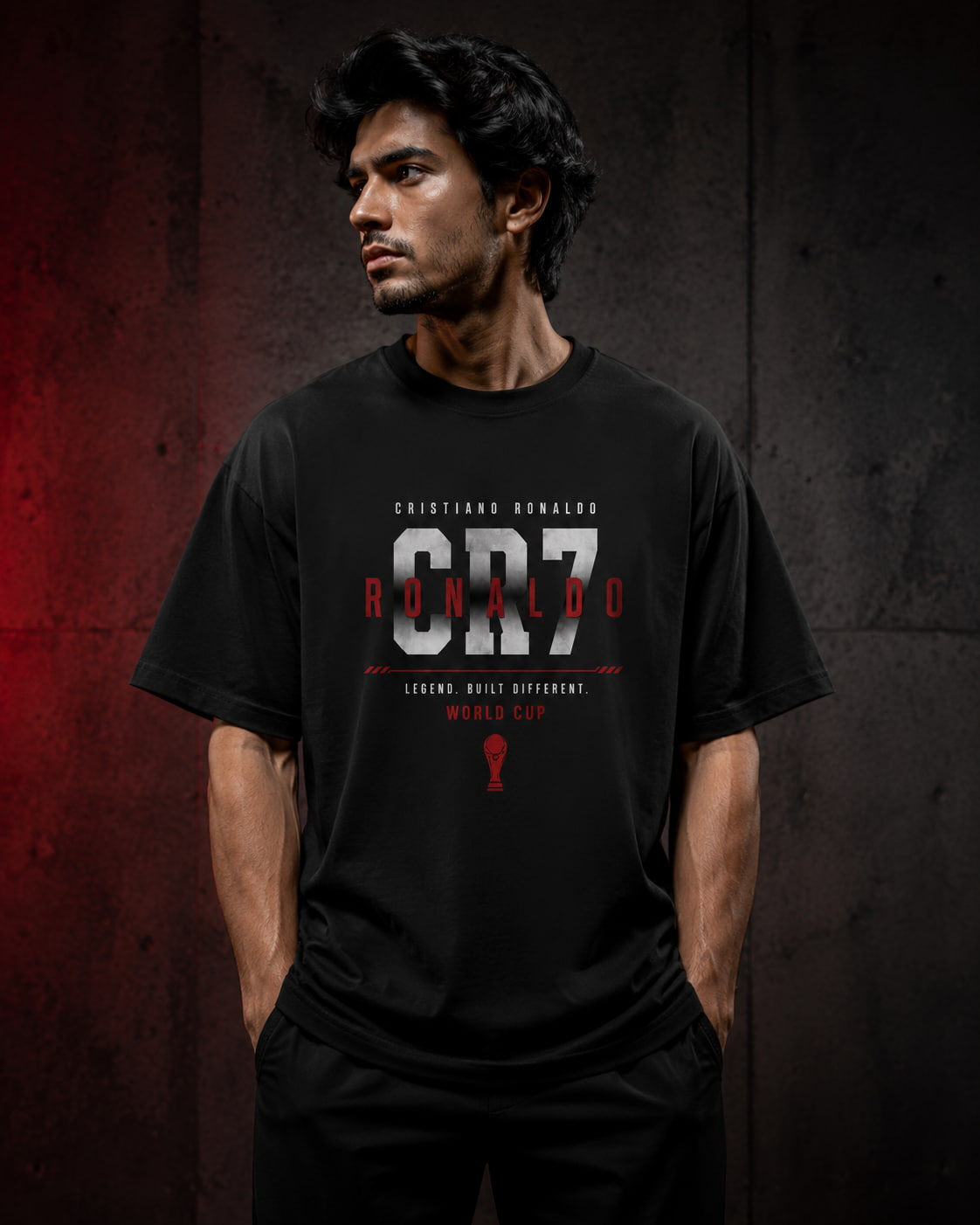 Man wearing a black t-shirt with 'CR7' branding against a dark background