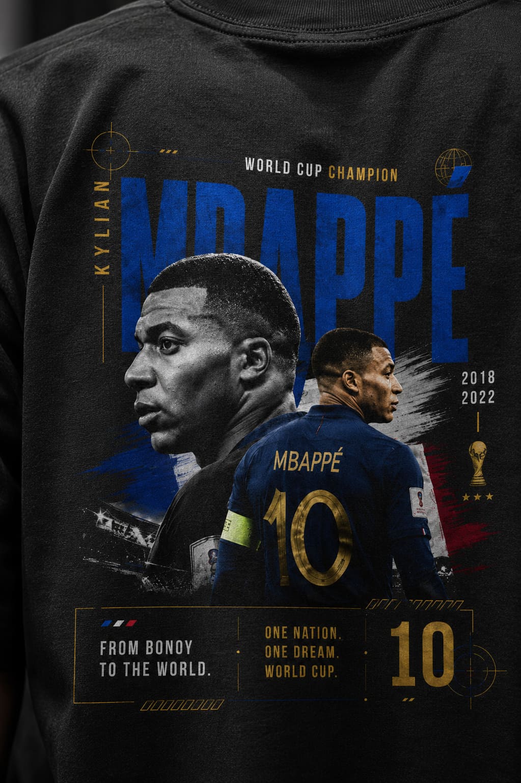 T-shirt with Kylian Mbappé graphic, World Cup champion text, and soccer player image.