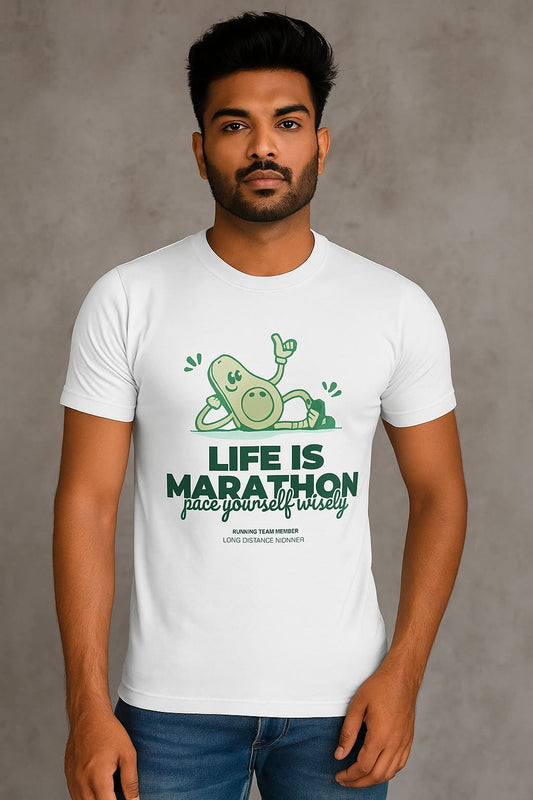 Man wearing a white t-shirt with a green graphic and text on a gray background