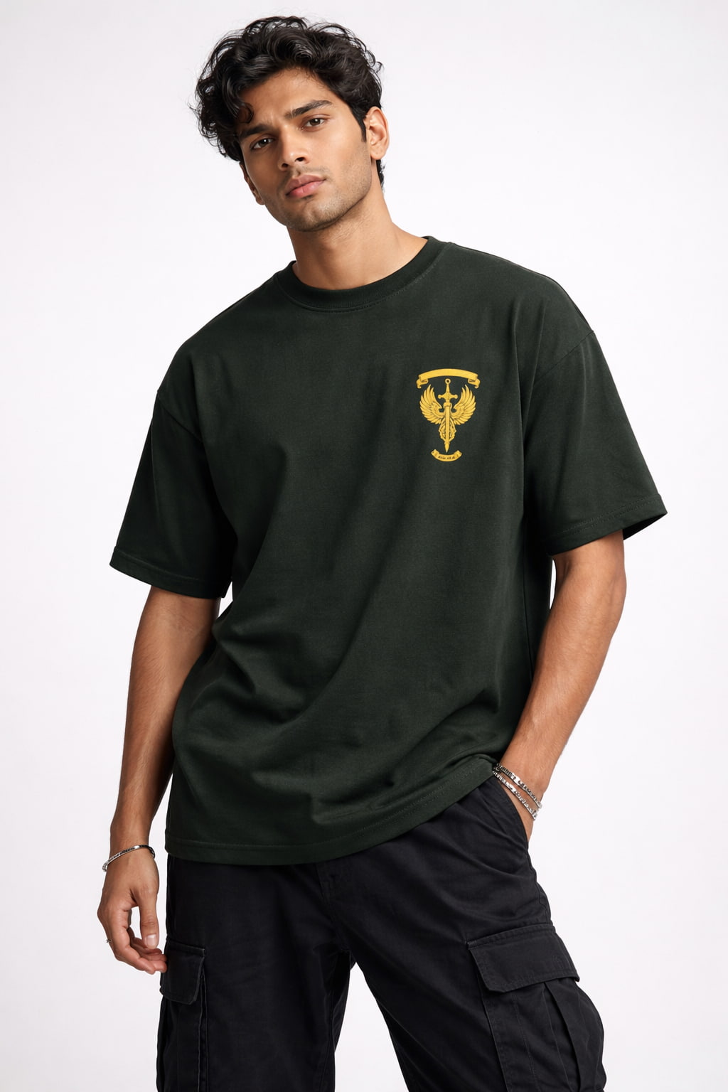 Man wearing a black t-shirt with a yellow logo on a white background
