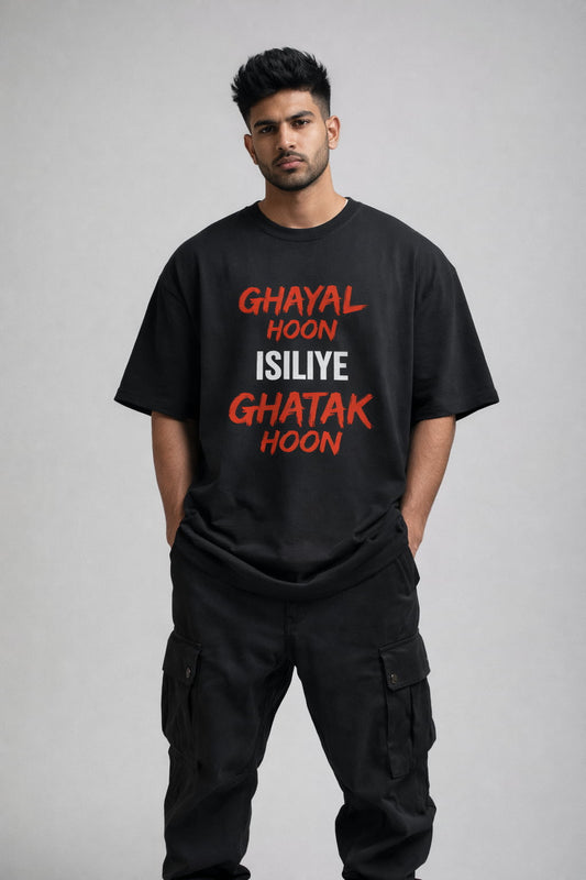 Person wearing a black t-shirt with red and white text on a gray background