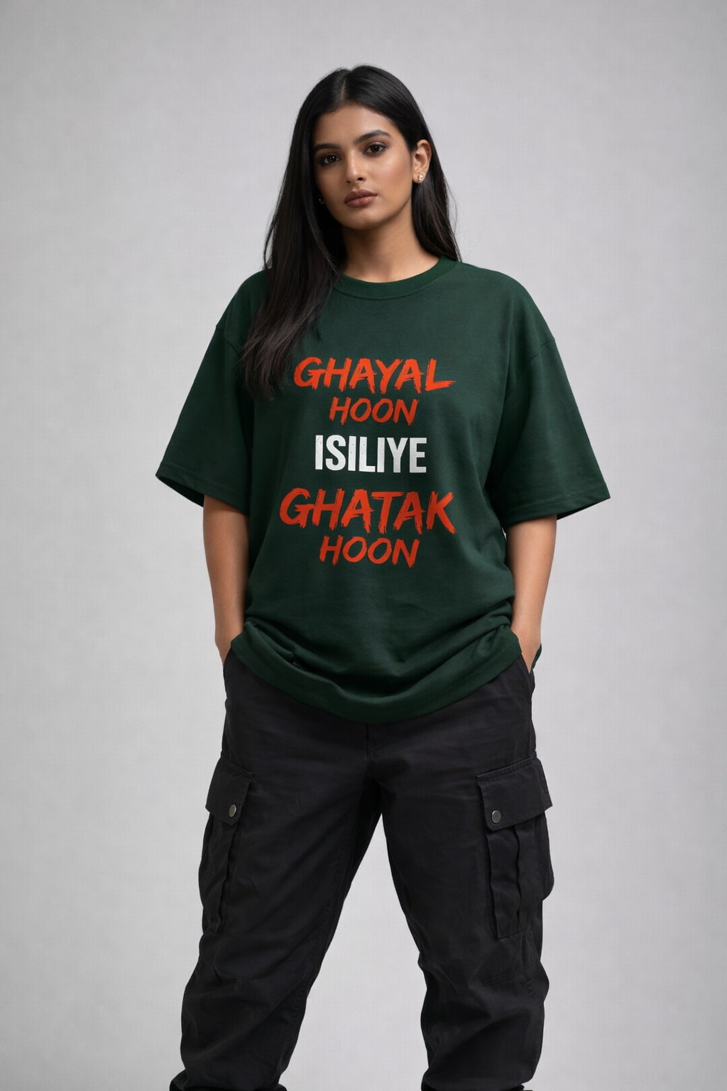 Person wearing a green t-shirt with red and white text on a gray background