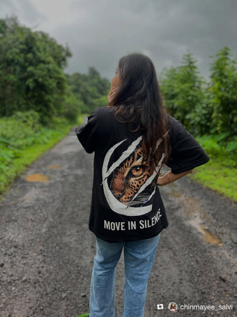 Chinamyee Salvi wearing the Soulset Paw Clash Tee: a blackt-shirt with a Tiger Claw design on back