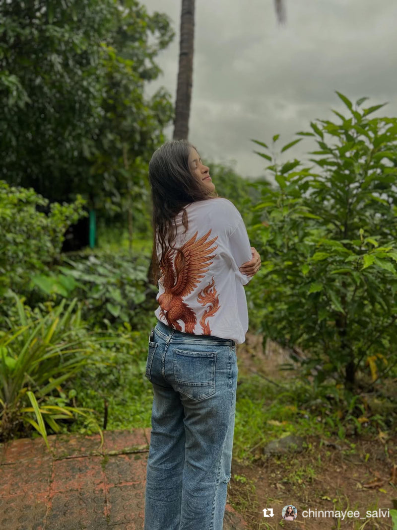 Chinamyee Salvi wearing the Soulset Mynthbourne Tee: a white t-shirt with a dragon design on back 