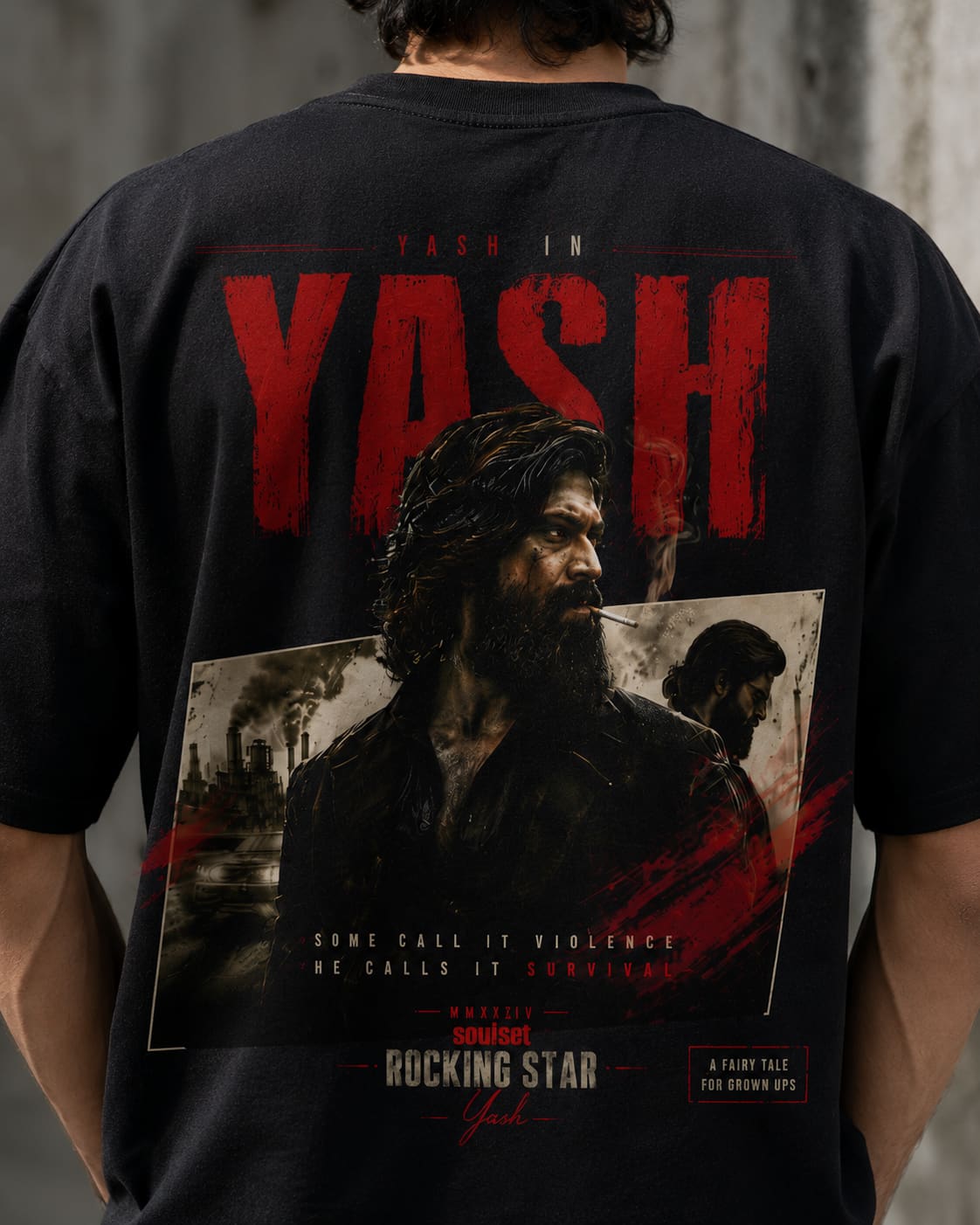A person shown from the back wearing a black graphic T-shirt with a large red and white print featuring the text 'YASH' and a portrait-style design.
