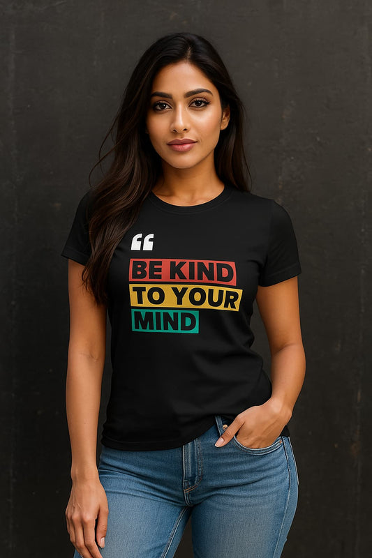 Woman wearing a black t-shirt with a motivational quote on a dark background
